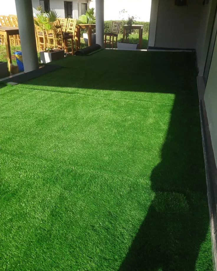 Synthetic turf installed over a prepared base Synthetic turf installed over a prepared base