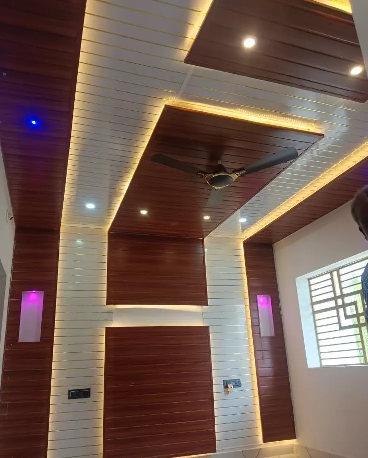 Wood-texture PVC false ceiling in a kitchen installed by JK Interior in Bihar